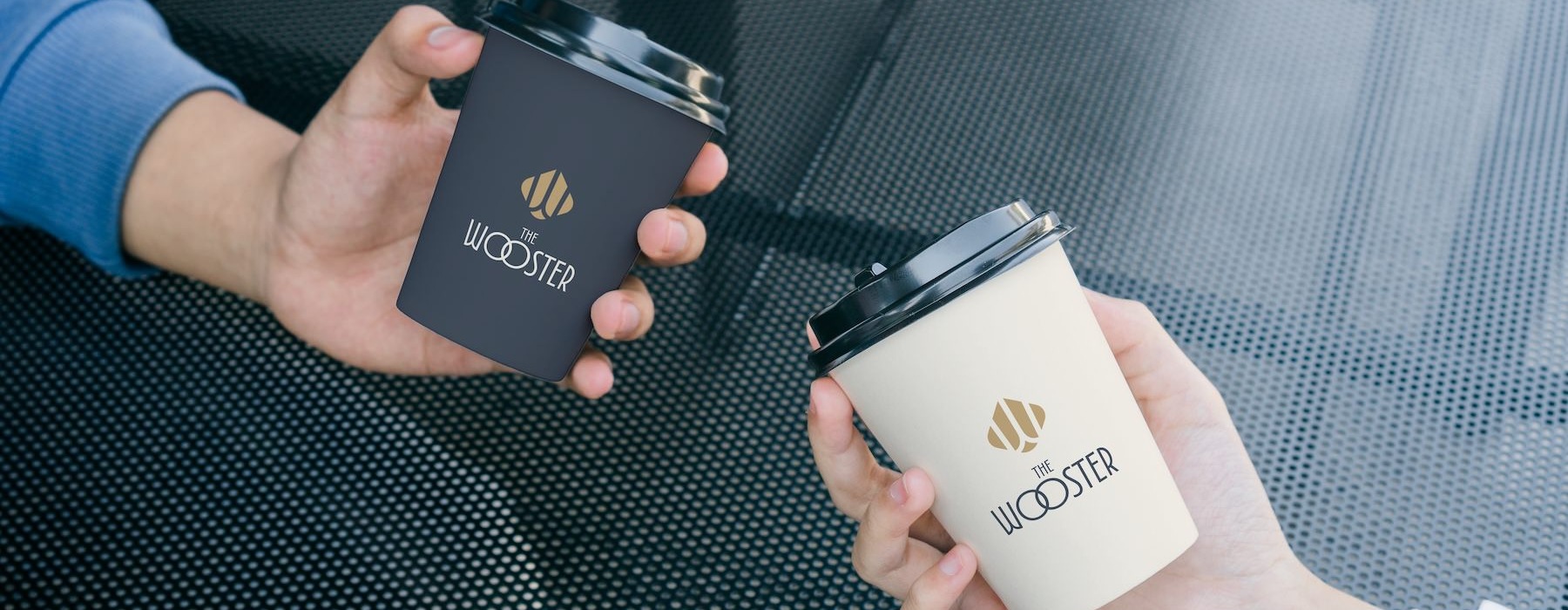 people holding cups of coffee