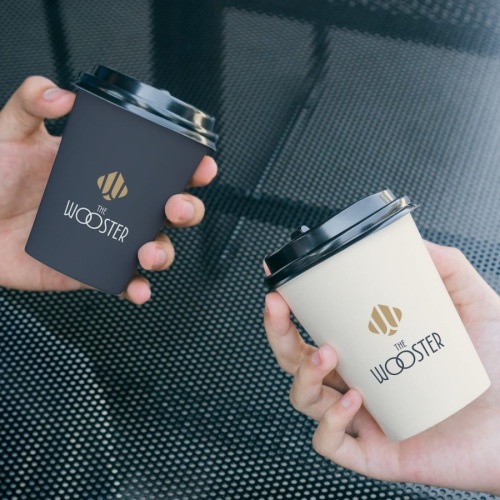 people holding cups of coffee