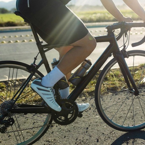 a person riding a bicycle outside