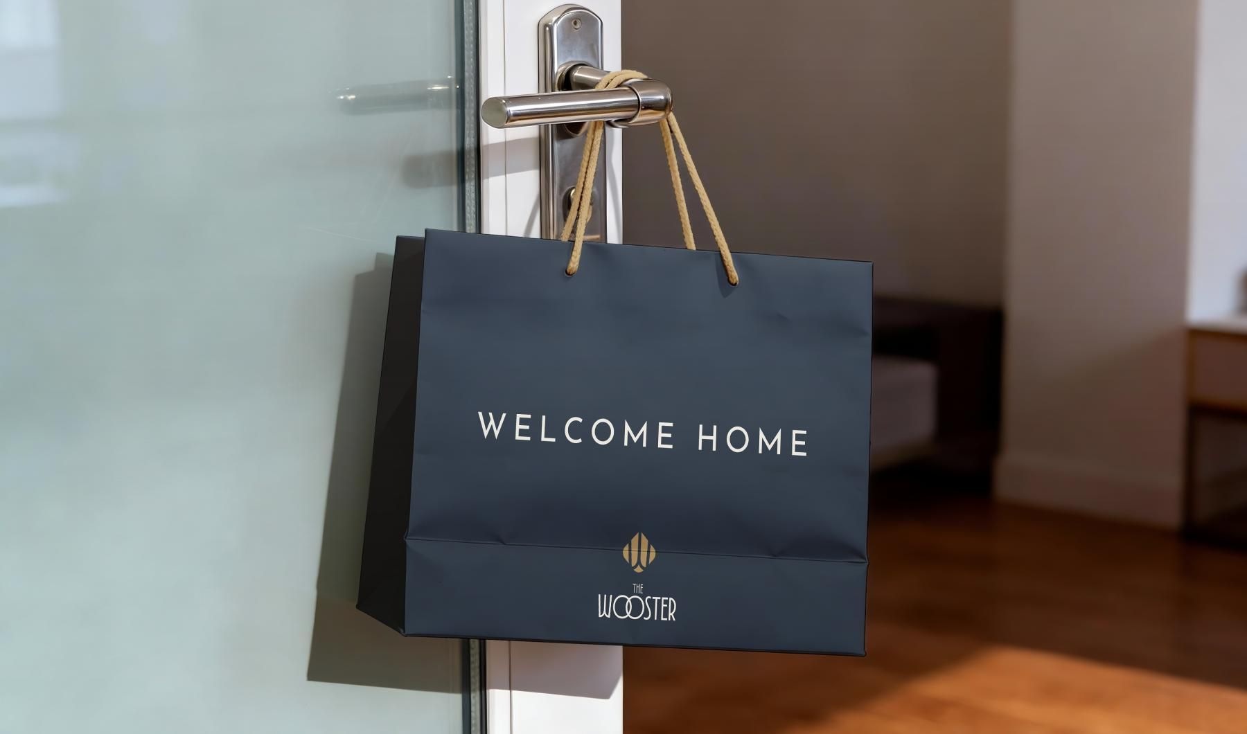 a blue bag hung on a door knob